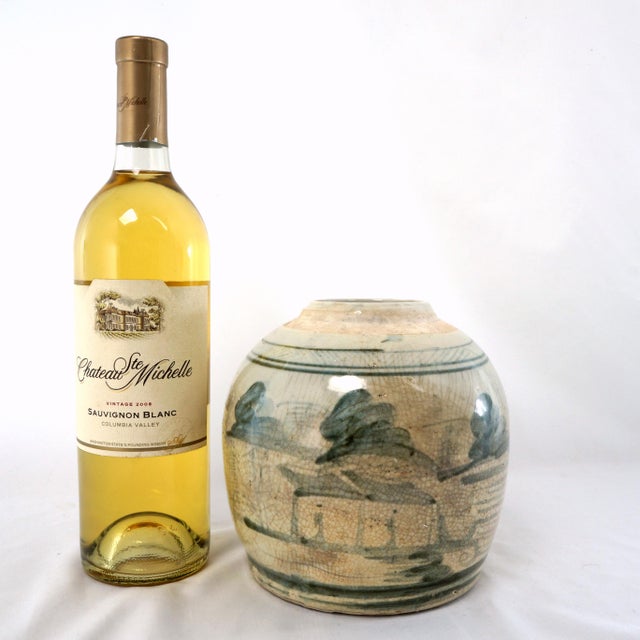 An 18TH century Chinese blue & white porcelain ginger jar, decorated with a harbor scene. It is a hands-on Chinese ginger...