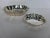 Set of two silver plate scalloped shape serving bowls. Maker's mark reads "International Silver". Minor wear, some...