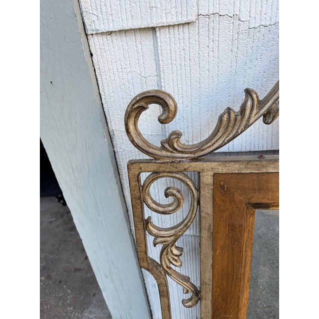 Large Vintage Mediterranean Revival Beveled Wood & Antiqued Gilt Metal Scrollwork Wall Mirror An impressive large-scale...