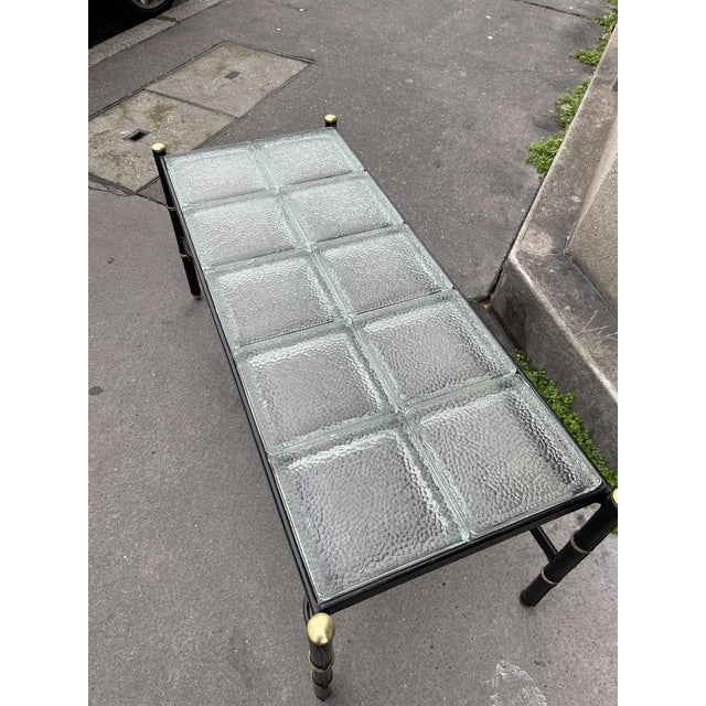 Rare leather-covered table with Saint-Gobain glasses I have official proof of authenticity such as vintage catalogs,...