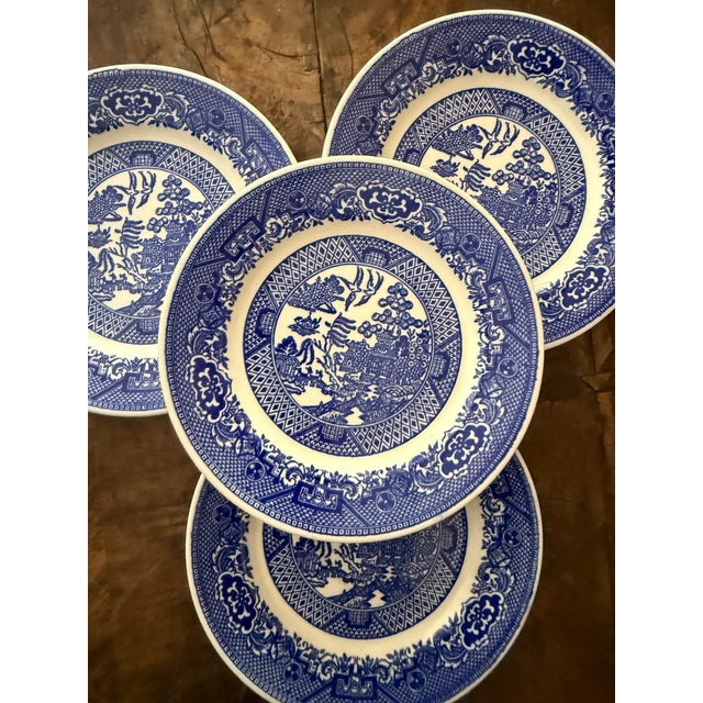 A classic set of four Blue Willow bread plates featuring the timeless blue and white transferware pattern that has graced...