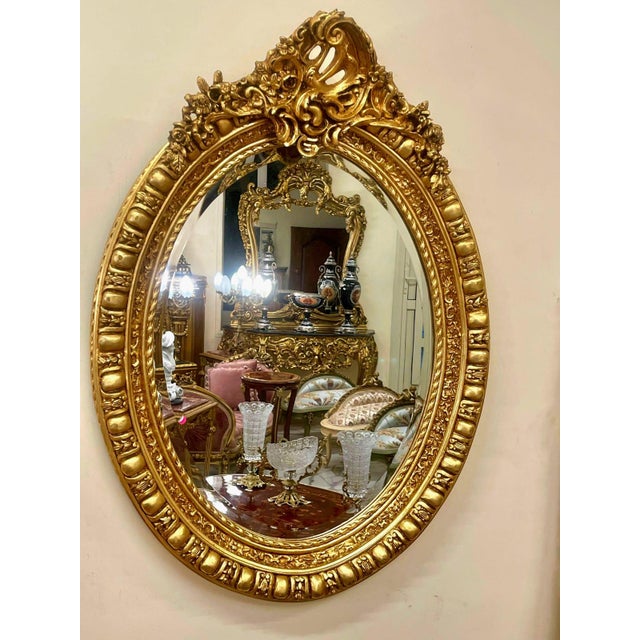 Rococo Oval Wall Mirror With Floral Center Detail & Gold Leaf Frame For Sale - Image 3 of 4