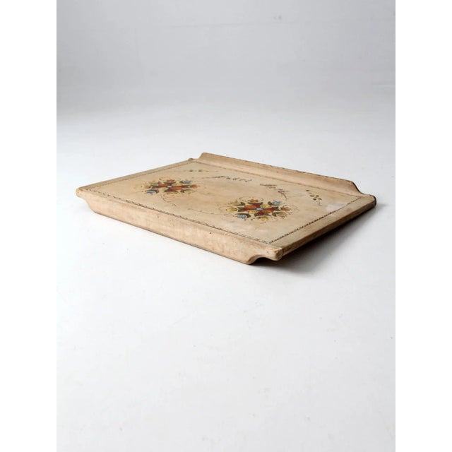 This is an antique German noodle board. The traditional kitchen work board features a decorative hand-painted display side...