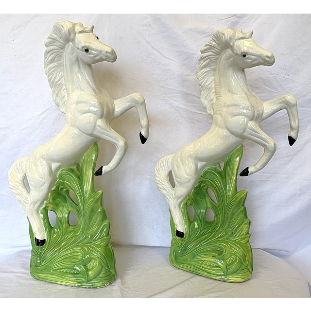 Great pair of vintage ceramic horses from the mid to late 20th century. They are made of cast white ceramic and look like...
