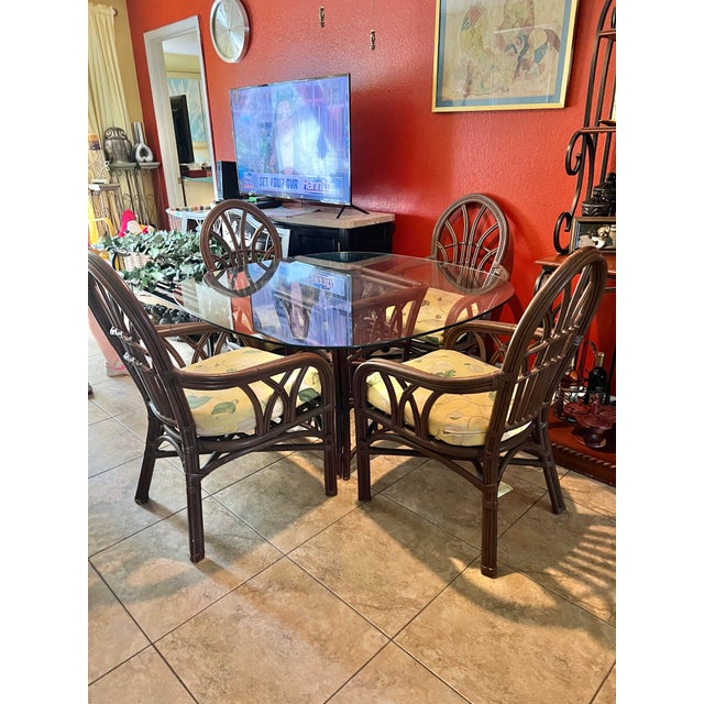 1970s Bamboo Round Glass Top Table and chairs. The glass top round table has a 47” diameter. The pedestal base is bamboo...
