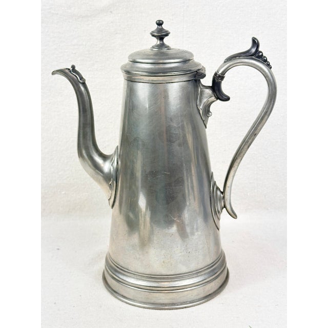 Lovely antique pewter coffee pot. Made between 1835-1879 by James Dixon & Sons. It is made from Britannia metal, a high-...