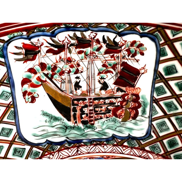 Antique Meiji Period Imari Charger Featuring a Nanban Presentation of Black Ships and Portuguese Merchants and Sailors For Sale - Image 13 of 18