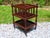 Vintage Mahogany Canterbury Magazine Rack Music Stand is a portable, occasional piece of furniture consisting of an open...