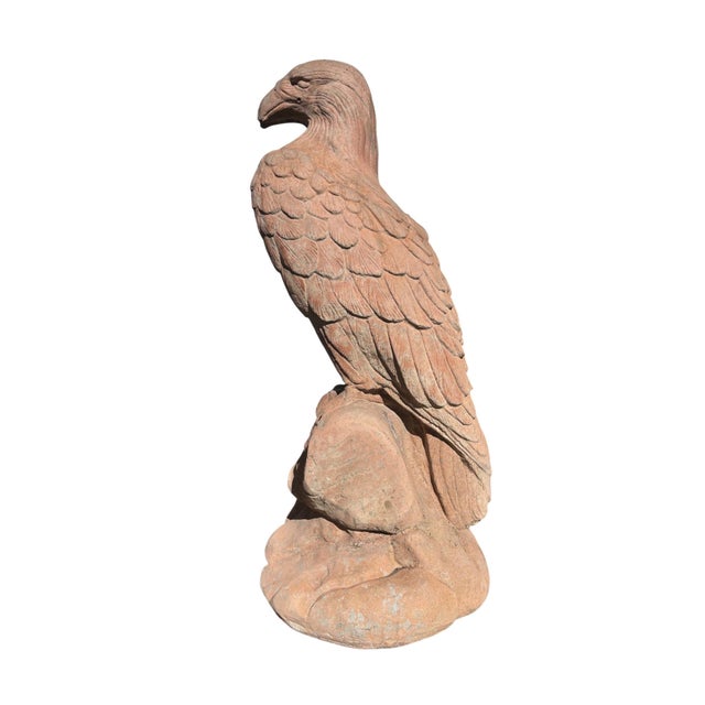 From a South Pasadena estate, a commanding terracotta eagle perched atop a naturalistic rocky base. Hand-modeled with...