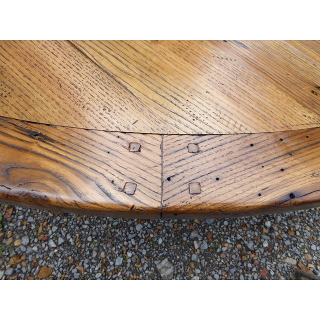 Early Americana at its best. Reclaimed 1800's extinct chestnut. 68'' dia. seat 8 with this bold table. Hand tooled,...