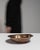 This early 19th century serving piece from Belgium is finished in terra cotta, worked in copper. Its form follows honest,...