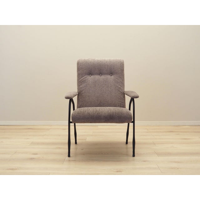 The armchair was made in the 1970s, Italian production. The legs are made of metal. The armchair has undergone upholstery...