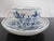 Meissen porcelain coffee cup and saucer set in classic Blue Onion (Zweibelmuster) pattern. Scalloped rim on cup and...