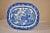 19th century English platter in the highly collectible "Blue Willow" pattern. The platter is in vibrant hues of blue and...