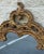 Stunning baroque style mirror with intricate carvings and patina gold leaf finish. Beveled mirror - excellent near new...