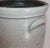 This fine butter churn has the salt glaze and blue decoration with a number six on the face of the crock. It has the...