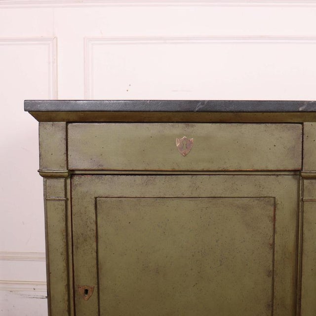 Pair of late 19th C French bedside cupboards with later mottled green paint and painted faux marble top. The doors will be...