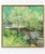 This vintage Impressionist landscape art print features a white garden bridge surrounded by lush greenery and a gently...