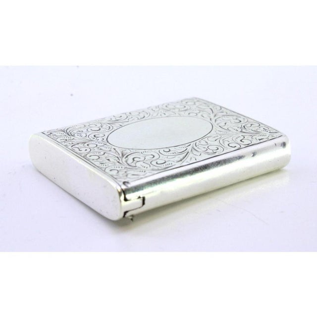 Victorian Silver Matchbox with Engraved Plant Motifs, Monogram Card and Hinged Lid, in Very Good conditions. Designed 1890...