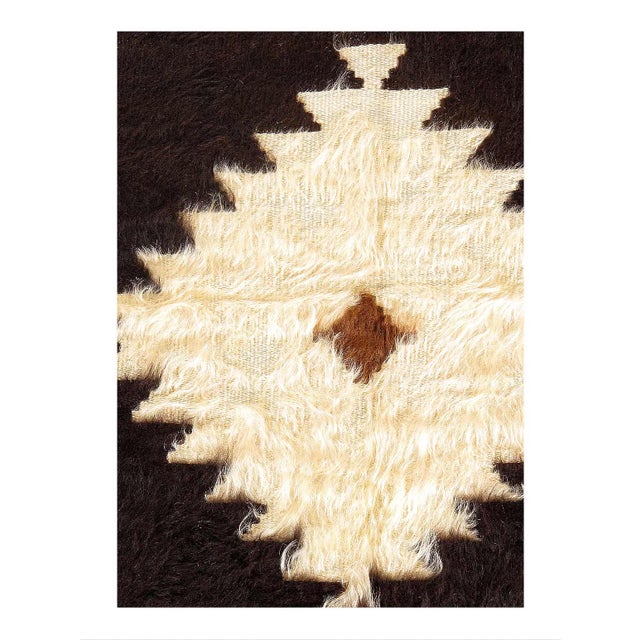 A vintage hand knotted goat hair rug, ca 1960s. These rugs have been made in from the mohair wool of Angora Goats in the...