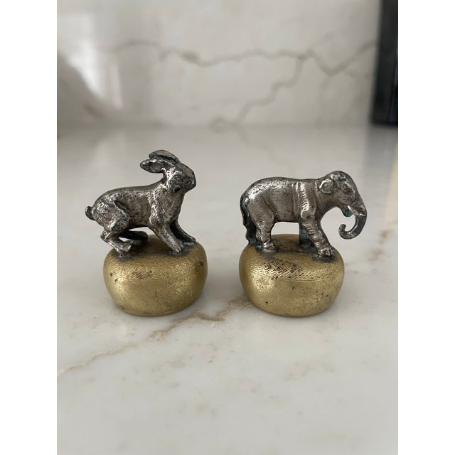 These darling cork toppers are white metal and brass. The brass base is delicately etched and the white metal depicts...