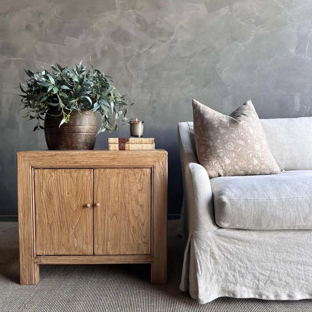 Introducing the Niki Nightstand, crafted from solid reclaimed elm wood with a natural wax finish. This stunning piece...