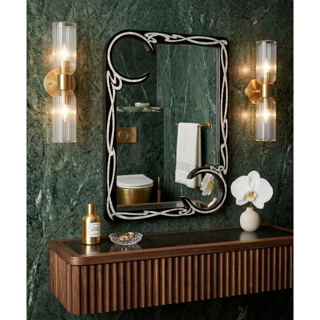 Outstanding one of kind design handcrafted with natural mother of pearl on ebonized walnut wood. The smooth flow of the...