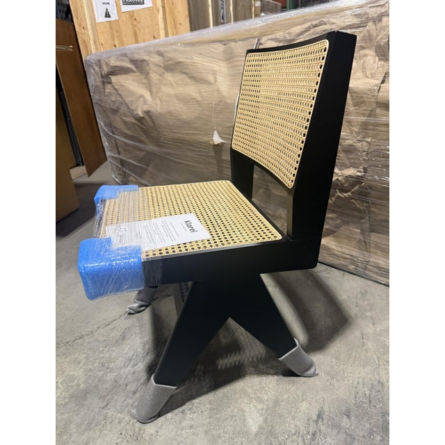 New (in the box) Klarel Chandigarh Chairs; Side chair with diamond weave Viennese cane seat and back, available in teak,...