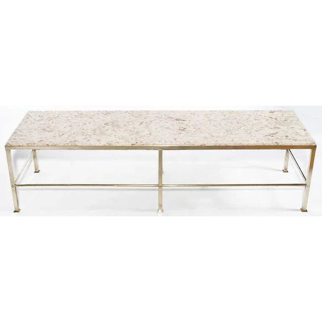 Clean lined Dunbar brass and marble coffee table designed by Edward Wormley. Solid brass bar frame with solid brass rod...