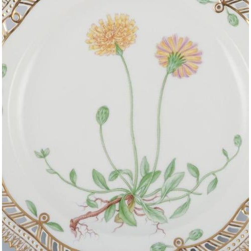 Royal Copenhagen Flora Danica openwork lunch plate in hand-painted porcelain with flowers and gold decoration. Model:...