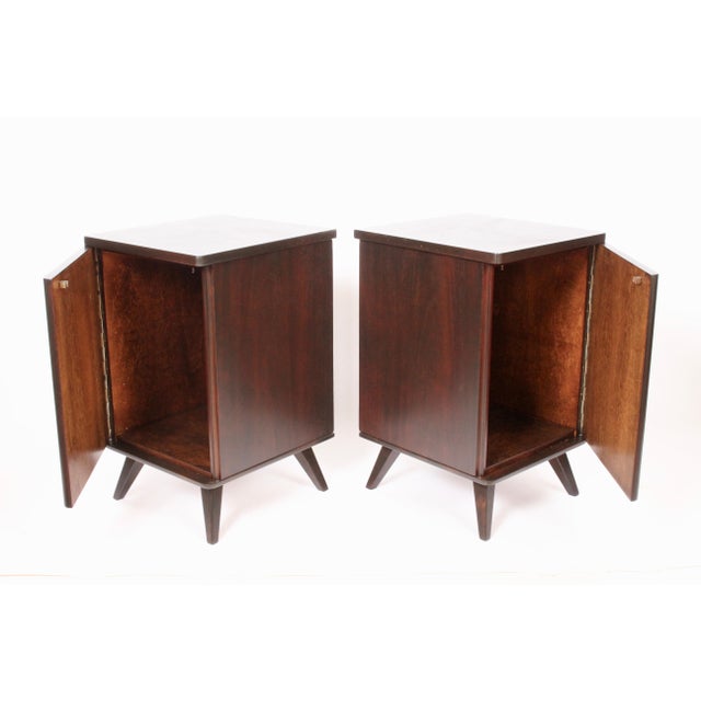 Pair of Swedish handcrafted dark walnut nightstands, circa 1950. Featuring a finely crafted, sturdy square, beautifully...
