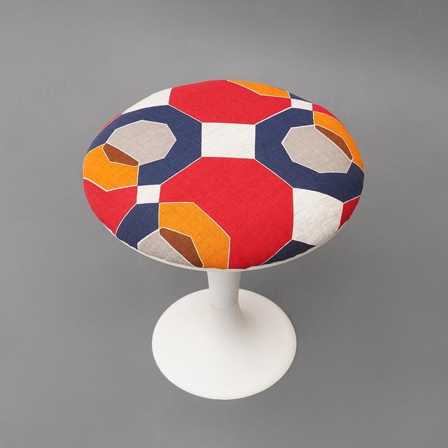 Space age stool with tulip base, produced in the 1960s, characterized by soft lines and a compact shape typical of the...