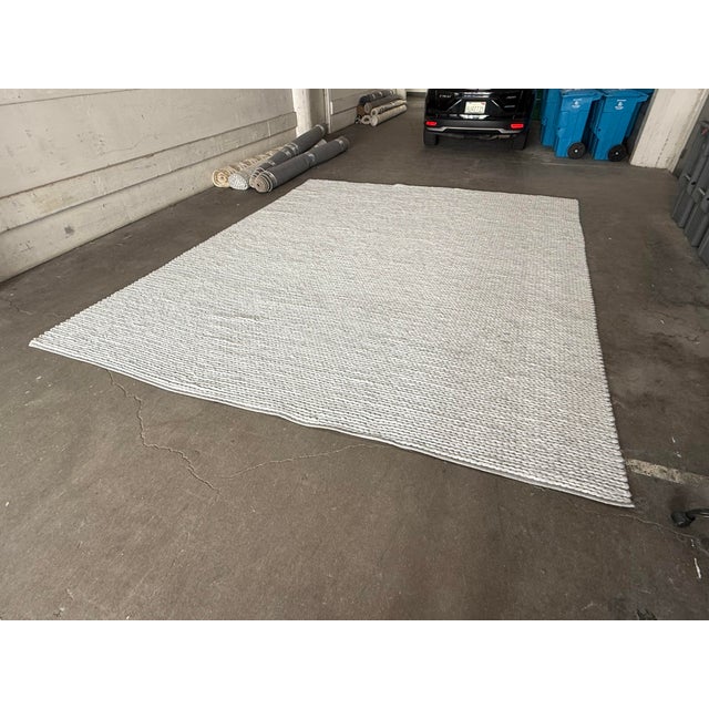 Design Plus Gallery presents an 11 ft 9 in × 14 ft 7 Arlow Collection in Handwoven Textured Poly Blend Area Rug from...
