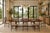 This sculptural set of eight Brazilian Modern dining chairs was produced by Celina in the 1960s. Each chair is defined by...