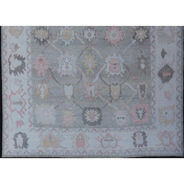 Measures: 9'0 x 11'9 Tribal Design Turkish Oushak Rug with Medallions in Light Green and Multi Colors. Keivan Woven Arts /...