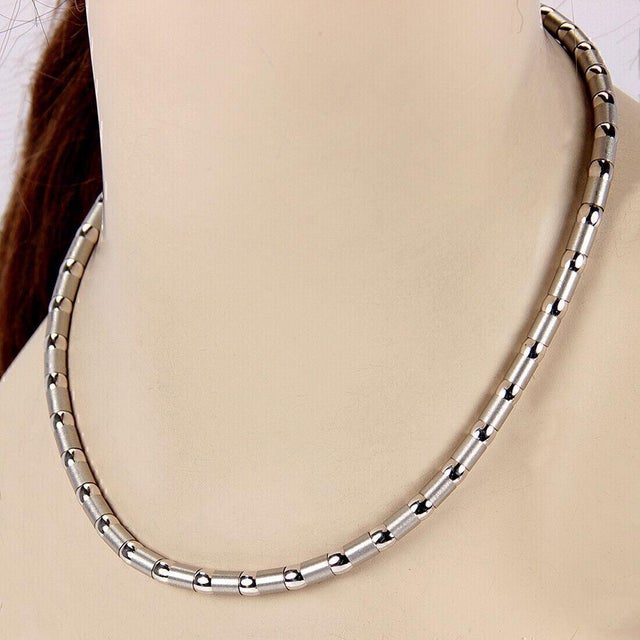 This authentic necklace is by Zancan, well crafted from 18k white gold with alternating brushed and polished tube like...