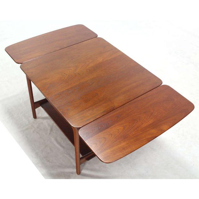 Very nice Mid-Century Modern solid teak square coffee table. Opened: W54" x D30" x H22"