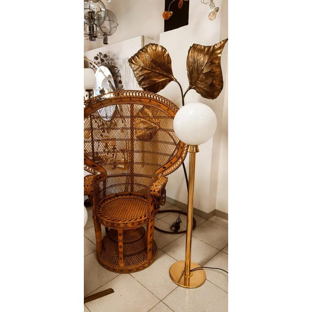 Reading Lamp in Brass with White Sphere, in Very Good conditions. Designed 1970 to 1979 European Plug (up to 250V).The...