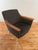 Mid century modern chair designed by Torbjorn Afdal for Stranda Industri. The chair features sharp teakwood arm rests that...