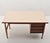 1960s Schirolli-signed desk, an authentic example of Italian mid-century modern design, characterized by clean lines and...