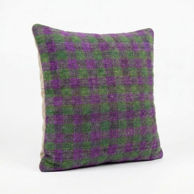 This beautiful 16'' X 16'' pillow cover was made from an authentic Turkish Kilim. Bright colors of wool adorn the front of...