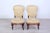 Elegant pair of armchairs design and English production of the early 900s. Wooden structure. Coating in precious damask...