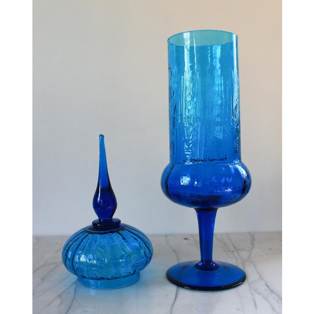 Vintage blue Empoli apothecary pedestal lidded glass jar. Marked "Made in Italy". Imperfections: Slightly crooked. One...