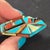 A masterpiece by Navajo artisan Richard Begay, this sterling silver coffin-shaped ring is adorned with intricate inlays of...