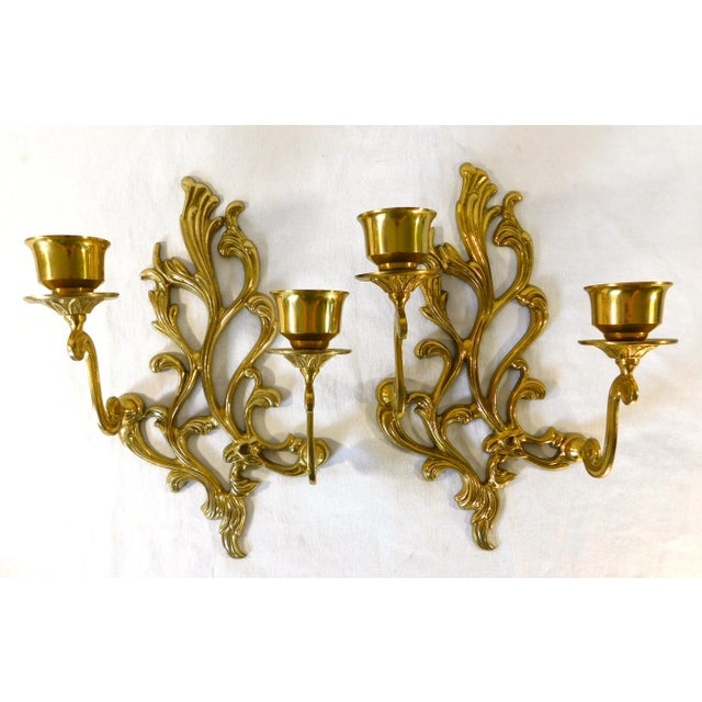 Wonderful pair of vintage ornate solid brass double candle wall sconces. Ready to hang. Circa 1970s/1980s. Very Nice...