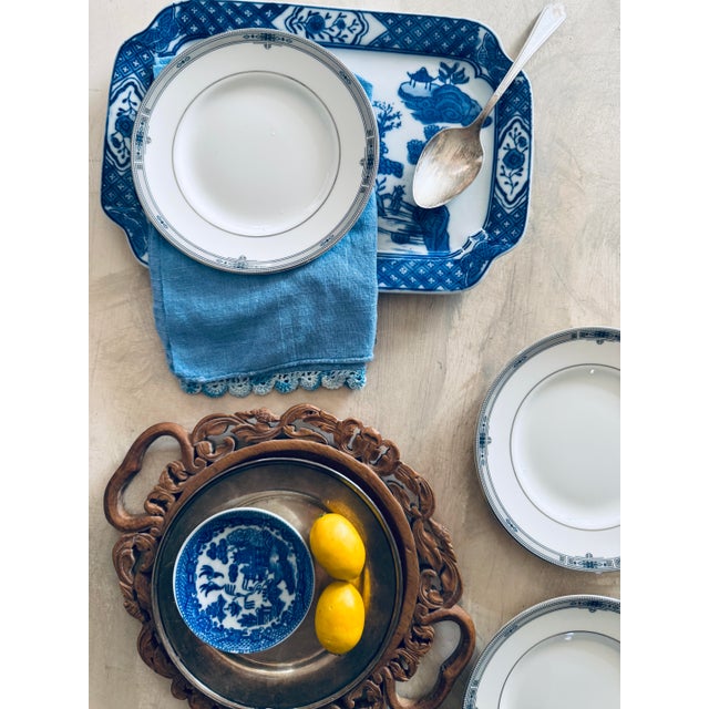 An elegant set of five Wedgwood Amherst bone china plates in the refined Dove gray colorway. This classic English pattern...