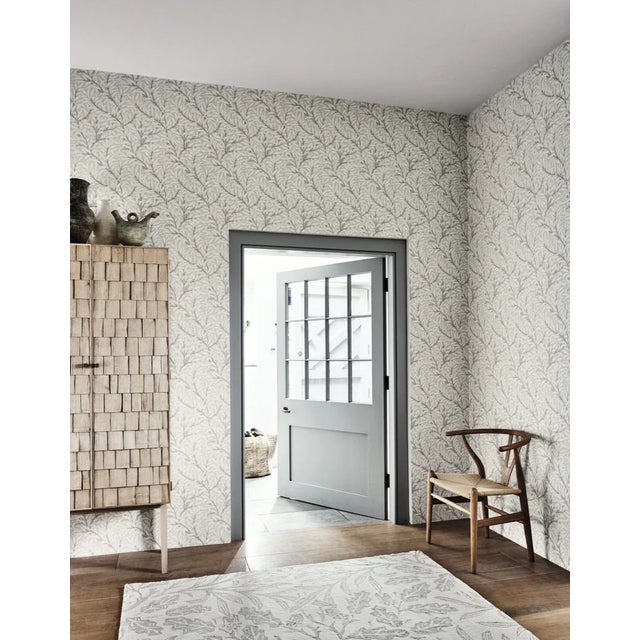 This much-loved Morris wallpaper design has been simplified and re-painted using three colours which brings a gentle...