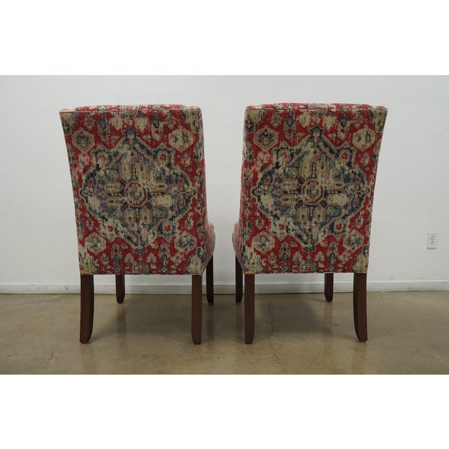 These Ballard Designs Gramercy Upholstered Chairs showcase a timeless transitional style with a refined, tailored...