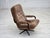 1970s, Danish swivel armchair. Original brown furniture corduroy, dark beech wood, five fingers base in steel. Original...