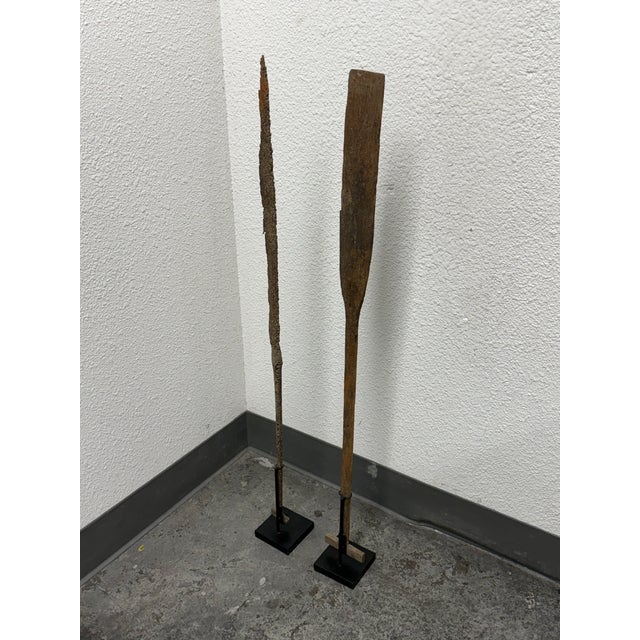 Design Plus Gallery presents a Pair of Antique Wood & Iron Oar Artifacts on Custom Stands. The set includes one weathered...